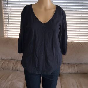 NWT. Black Anthropologie VNeck Blouse with Ruffled Cuffs.